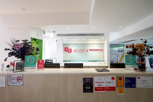 a ticket counter in a store with a sign on it at The Salvation Army - Booth Lodge in Hong Kong