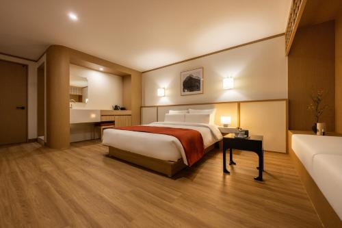 AanK Hotel & Spa Pyeongtaekにあるベッド