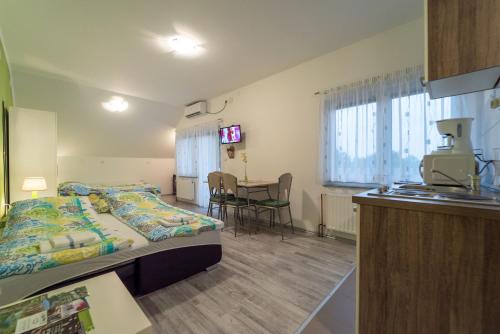 Ένα ή περισσότερα κρεβάτια σε δωμάτιο στο Studio Apartments Ante