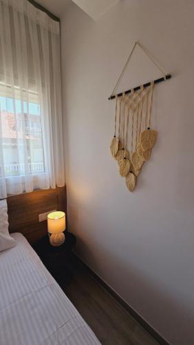 Postel nebo postele na pokoji v ubytování Niriides boutique suites