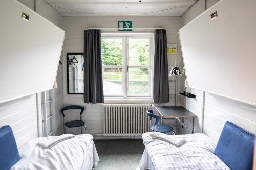 Postel nebo postele na pokoji v ubytování Danhostel Silkeborg