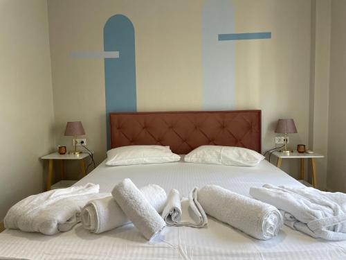 Postel nebo postele na pokoji v ubytování Kaza Oasis