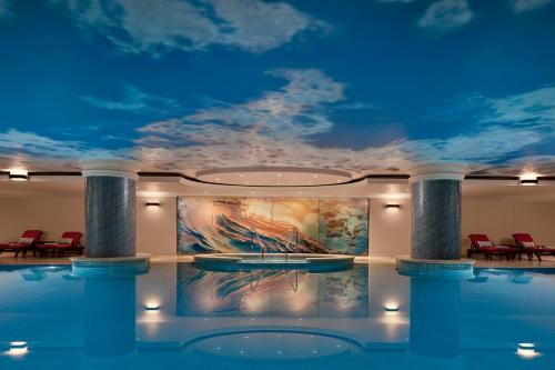 a room with a large painting on the ceiling at The Ritz-Carlton, Istanbul at the Bosphorus in Istanbul