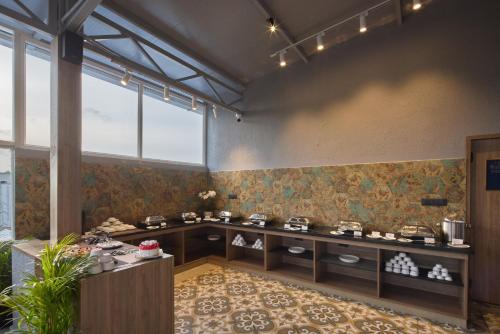 a large room with aasteryasteryasteryasteryasteryasteryasteryasteryasteryasteryastery at Grand Continent Mysore A Sarovar Portico Affiliate Hotel in Mysore