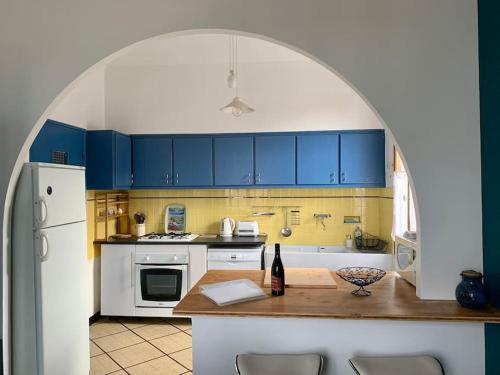 Η κουζίνα ή μικρή κουζίνα στο Pleasant Winemaker apartment