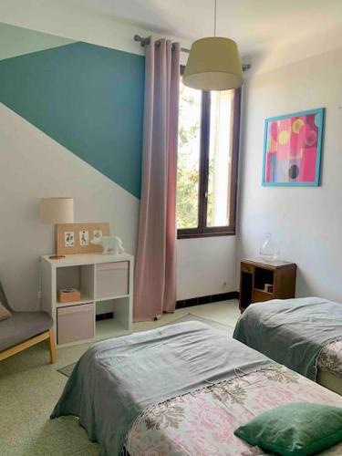 Ένα ή περισσότερα κρεβάτια σε δωμάτιο στο Pleasant Winemaker apartment