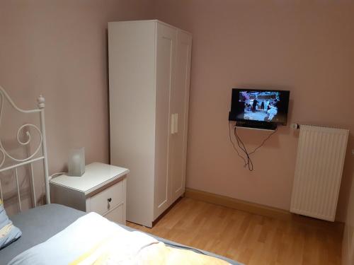 TV a/nebo společenská místnost v ubytování Ferienwohnungen Felten
