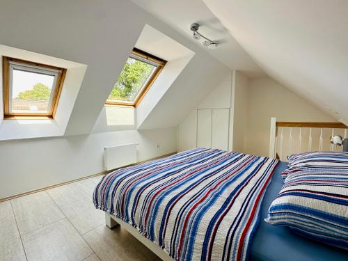 Postel nebo postele na pokoji v ubytování Ferienwohnung in Timmendorfer Strand, Niendorf an der Ostsee