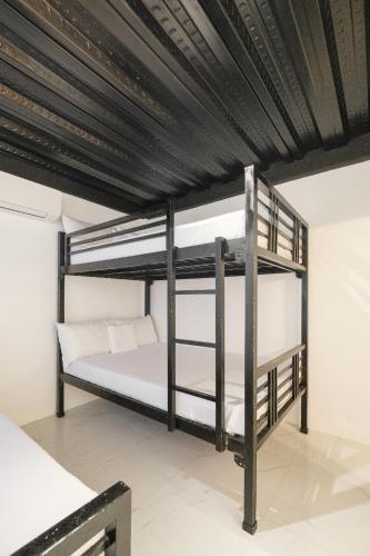 Ένα ή περισσότερα κρεβάτια σε δωμάτιο στο Breathe Cabin