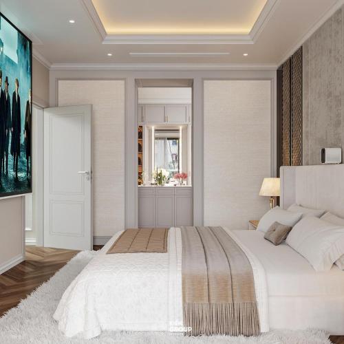 a bedroom with a large white bed and a window at FLC Sea Tower Quy Nhơn__Du Lịch Bình Định in Quy Nhon