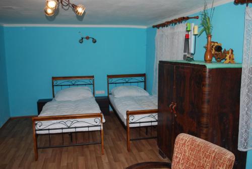 Postel nebo postele na pokoji v ubytování Chalupa U Tety v Bystrém