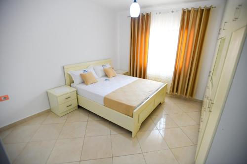 Ένα ή περισσότερα κρεβάτια σε δωμάτιο στο Apartment Rivaaa