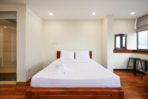Katil atau katil-katil dalam bilik di Red Sun Airport Saigon Hotel