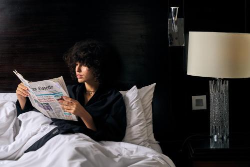 Voodi või voodid majutusasutuse Renaissance Cairo Mirage City Hotel toas