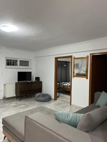 A television and/or entertainment centre at Cosy spot near the beach only 45 min from Athens