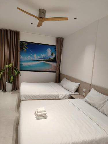 Letto o letti in una camera di Light House Motel 978