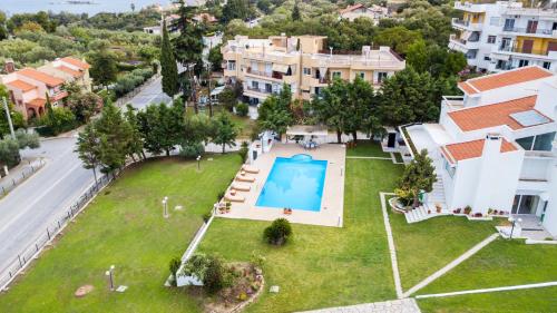an aerial view of a yard with a swimming pool at La Maison Blanche in Kavala