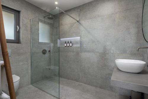 Ένα μπάνιο στο Casa Calme With Spa And Gym