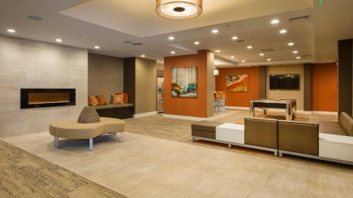 a living room with a couch and a pool table at Holiday in LA - 1br with Free parking, Laundry, Pool in Los Angeles