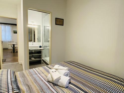 En eller flere senge i et værelse på Chez ROSE