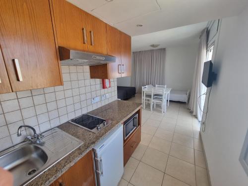 Kuchyň nebo kuchyňský kout v ubytování Alva Hotel Apartments