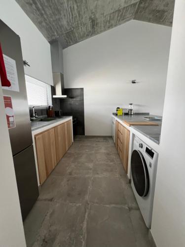 Η κουζίνα ή μικρή κουζίνα στο Casas SaoMiguel33