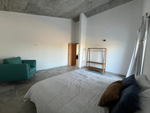 Ένα ή περισσότερα κρεβάτια σε δωμάτιο στο Casas SaoMiguel33