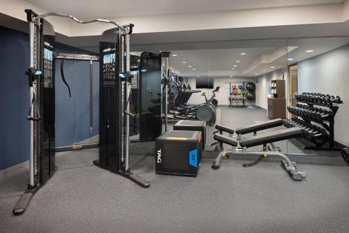 a fitness room with a gym with tread machines at Hampton Inn & Suites Myrtle Beach Oceanfront in Myrtle Beach
