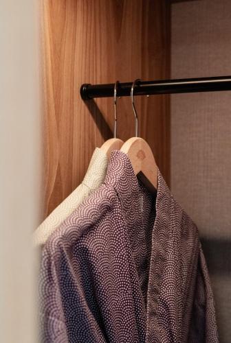 a towel hanging on a rack in a bathroom at Mandarin Oriental Palace, Luzern in Lucerne