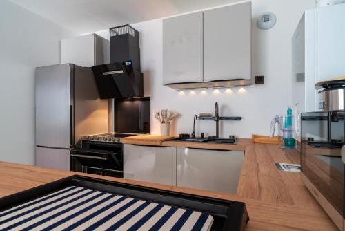 Dapur atau dapur kecil di L'Atlantic - Appt à moins 150m de la plage