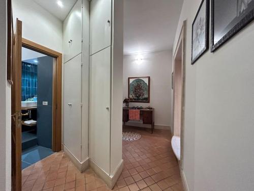 a hallway of a home with a hallway at Elegant 3 bedrooms apartment Colosseum - San Giovanni in Rome