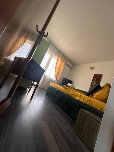 Ένα ή περισσότερα κρεβάτια σε δωμάτιο στο Casa Victor Cazanele Dunarii