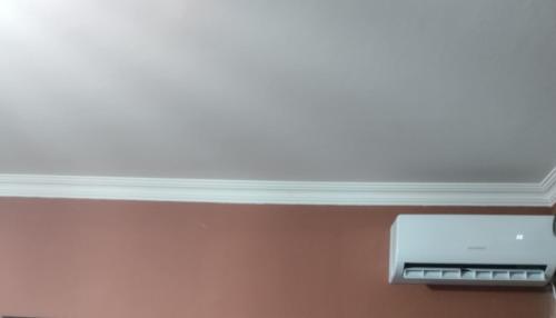 a room with a white ceiling and a air conditioner at Eka,s hotel in ortachala in Tbilisi City