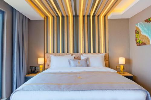 Ένα ή περισσότερα κρεβάτια σε δωμάτιο στο Maritimo Hotel