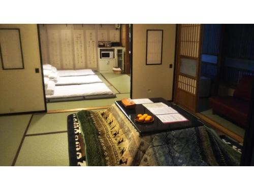 Postel nebo postele na pokoji v ubytování Tomareru sento taka no yu - Vacation STAY 00556v
