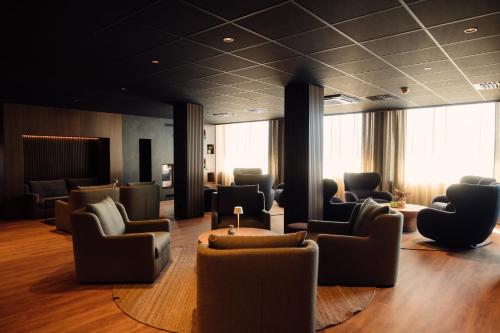 TV a/nebo společenská místnost v ubytování Bjerkvik Hotell
