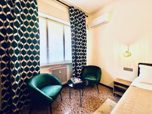 Letto o letti in una camera di Casa Margherita