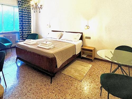 Letto o letti in una camera di Casa Margherita