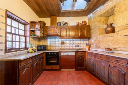 Kuchyň nebo kuchyňský kout v ubytování Casa da Concha