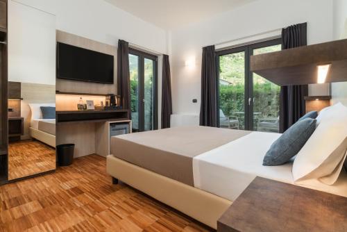 Postel nebo postele na pokoji v ubytování Residence Al Frantoio