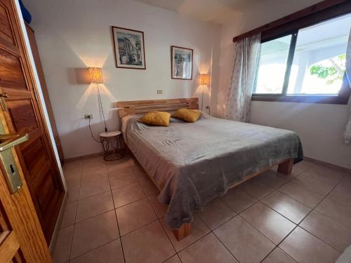 Voodi või voodid majutusasutuse Ocean View Apartment Tenerife & Parking WiFi toas