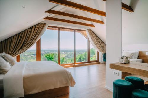 Ένα ή περισσότερα κρεβάτια σε δωμάτιο στο Villa Vukov Breg