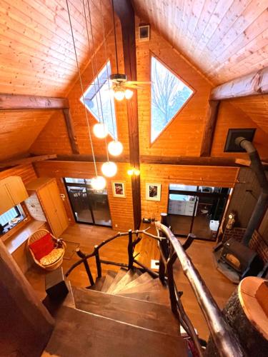 an overhead view of a staircase in a wooden house at beau lac biwako in Takashima