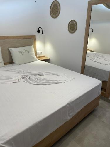 Ένα ή περισσότερα κρεβάτια σε δωμάτιο στο The Frog Apartment