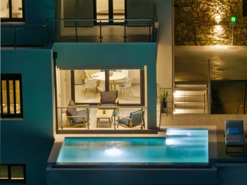 a view of a house with a swimming pool at Kalma Luxury Villas in Kalamata