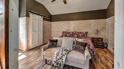 a bedroom with a bed and a chair at Memory Maker in Blue Ridge