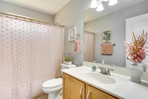 a bathroom with a sink and a toilet and a shower at Tucson Home with Patio, Grill and Mountain Views! in Tucson