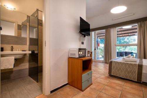 A kitchen or kitchenette at Residence Le Vele
