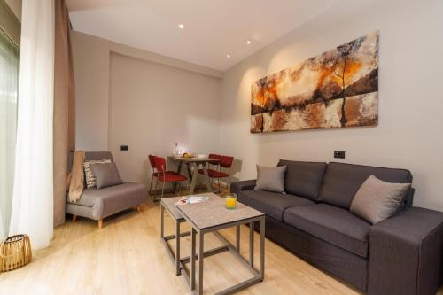 Χώρος καθιστικού στο Jolly Suites