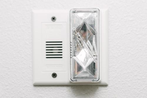 a white light switch on a white wall at Microtel Inn & Suites by Wyndham Olean in Olean